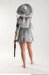 LUCI_AVIOL STANDING POSE WITH TWO GUNS 